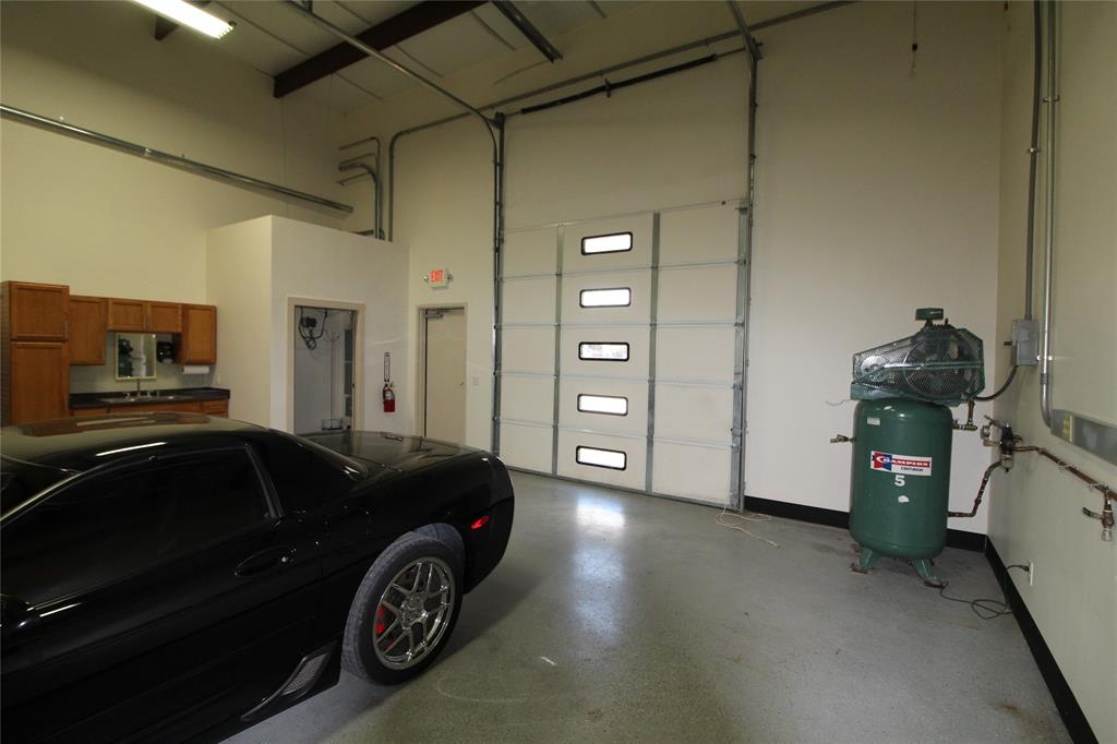 Shop view with rolling garage door.