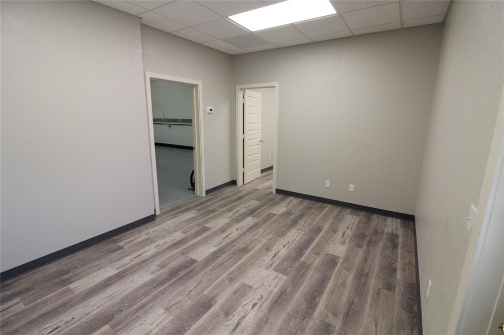 Open office that leads to shop area and looking into office 2. Open office that leads to shop area and looking into office 2.