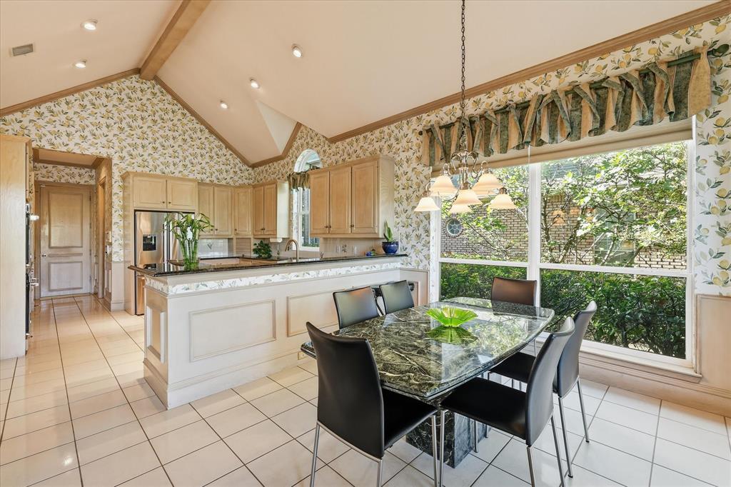 Porcelain floor tile throughout the breakfast nook & kitchen