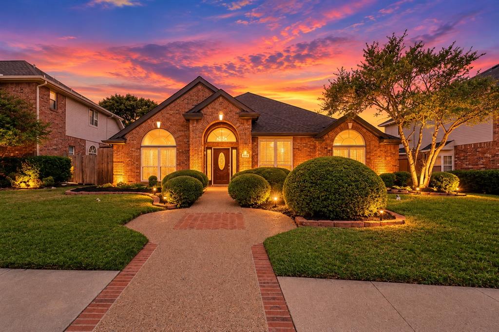 Virtual Twilight Brick Home Under Vibrant Sunset Virtual Twilight Brick Home Under Vibrant Sunset