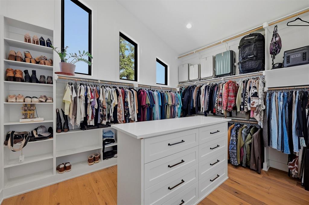 Primary Bedroom Closet with built-ins