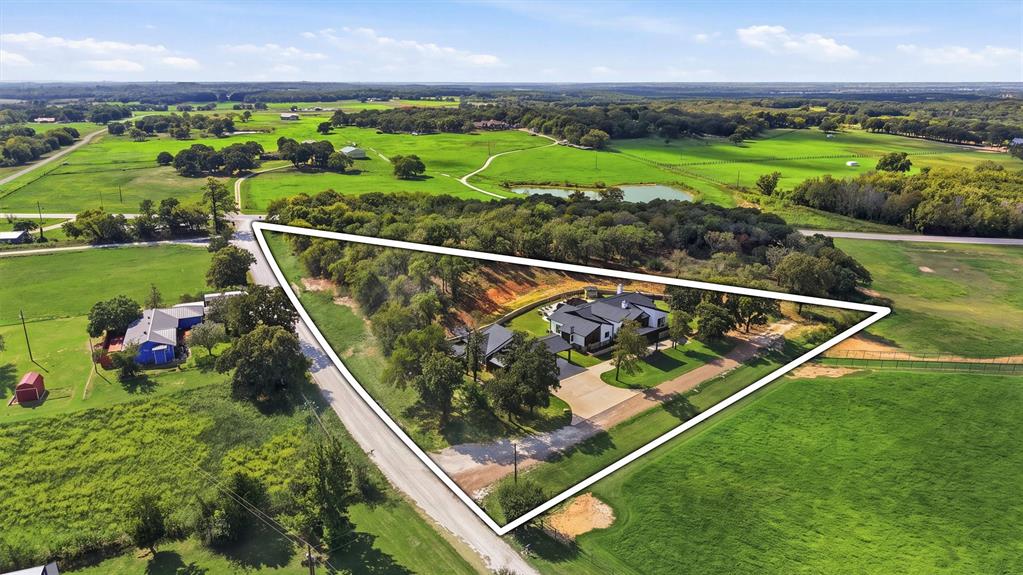 Aerial view of the property showing access off CR 2115 and FM 902