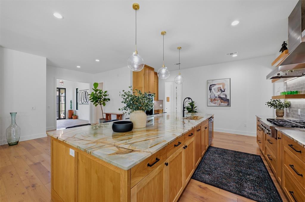 Kitchen - quartzite countertops, white oak custom cabinetry