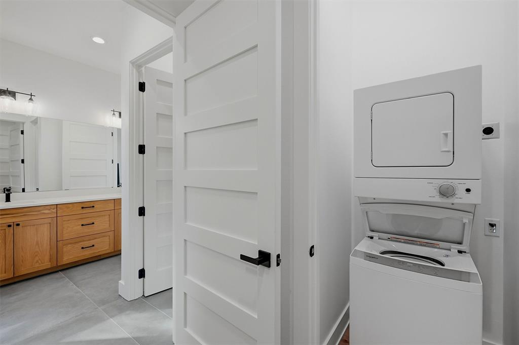 Casita - spacious bathroom and adjoining laundry with stacking washer and dryer