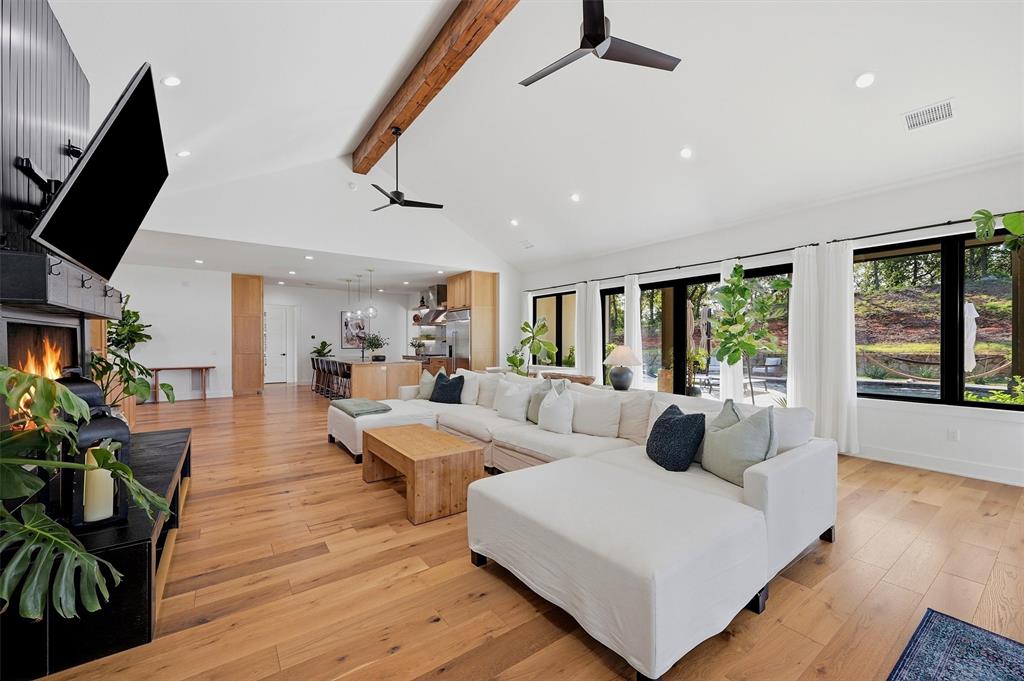 Open floor plan has great natural light and outdoor views - perfect for family and entertaining