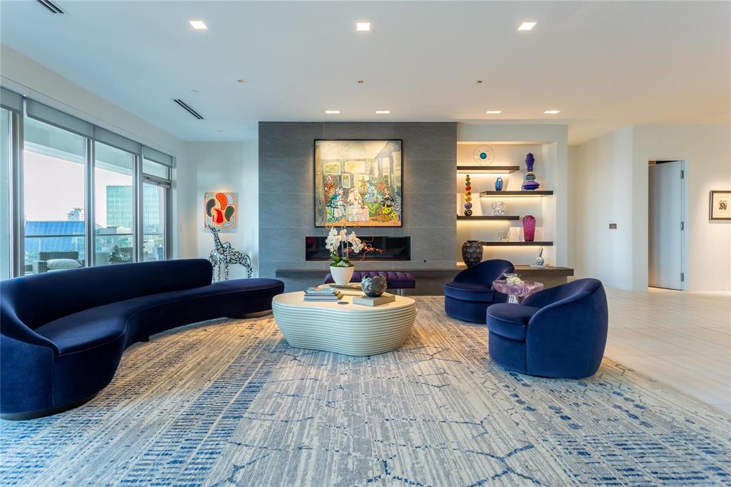 Living Room access to large protected Balcony.