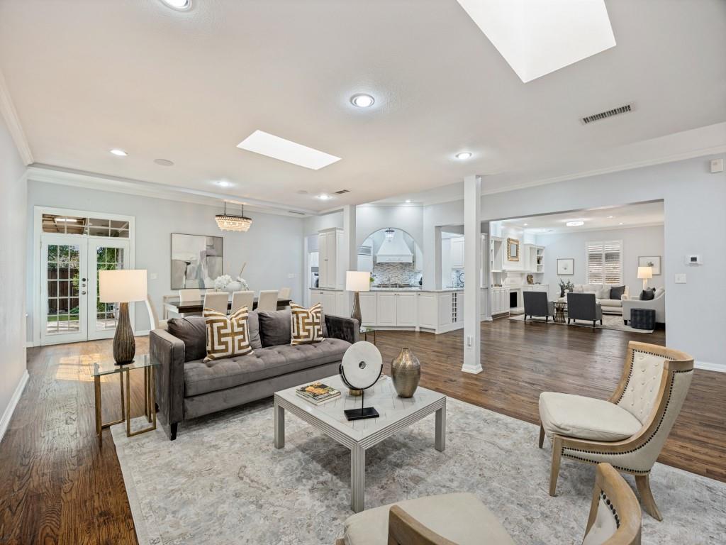 Open-concept living, dining and kitchen with skylights and hardwoods throughout Open-concept living, dining and kitchen with skylights and hardwoods throughout