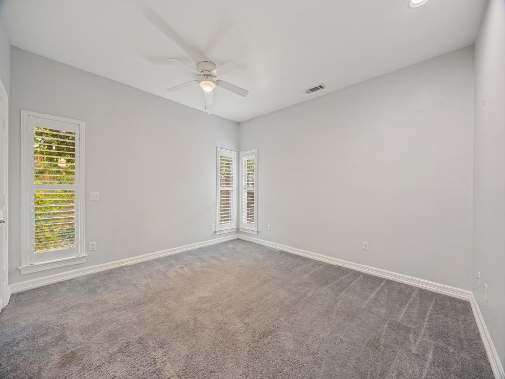 Bedroom with windows on two walls