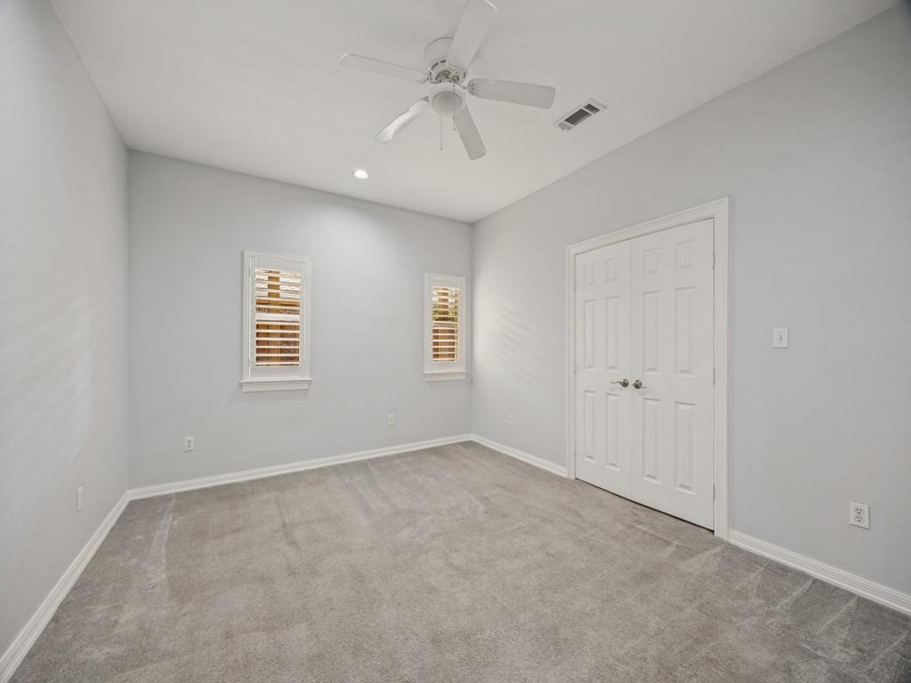 Bedroom with custom gift-wrapping closet.