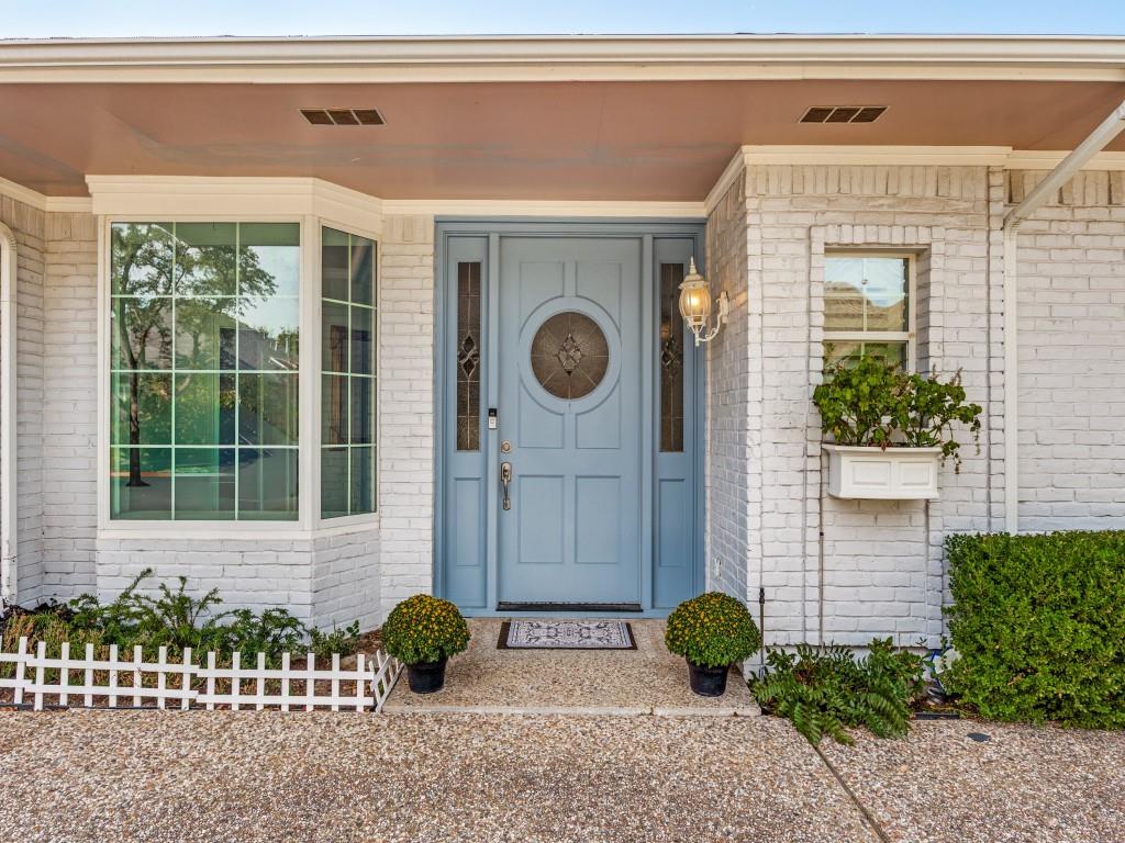 Covered front entry with sidelights and bay window Covered front entry with sidelights and bay window