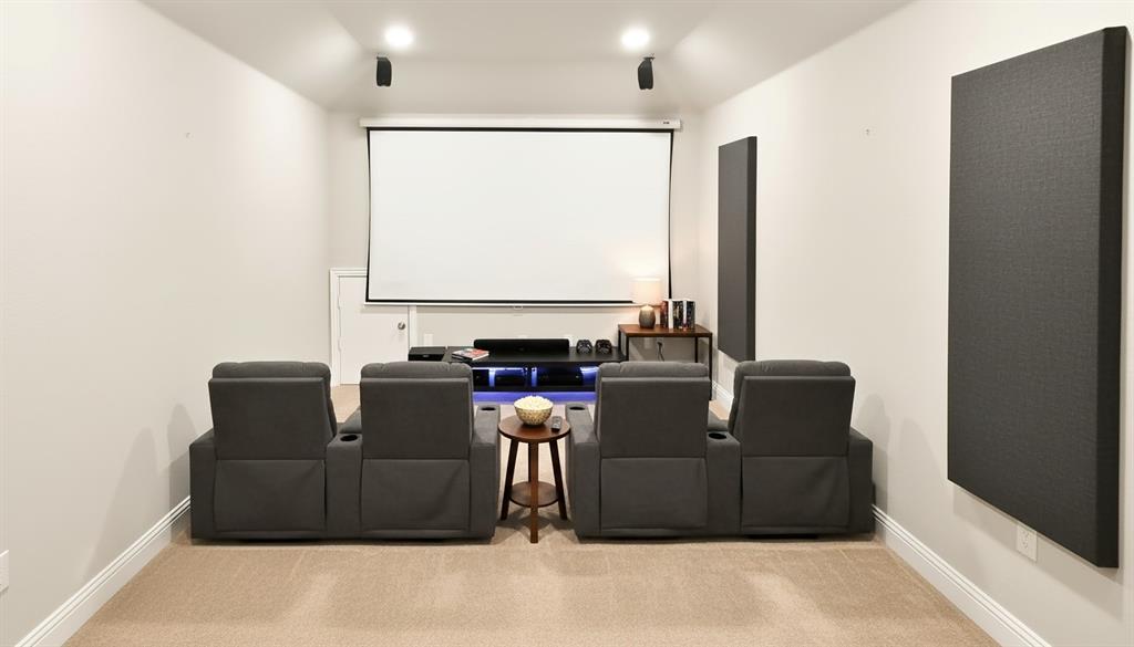 Virtually Staged-Media room featuring wall-mounted acoustic panels, recessed lighting, and wall-to-wall carpeting