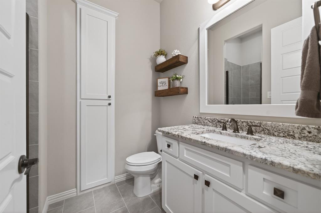 Downstairs full bathroom adjacent to guest bedroom