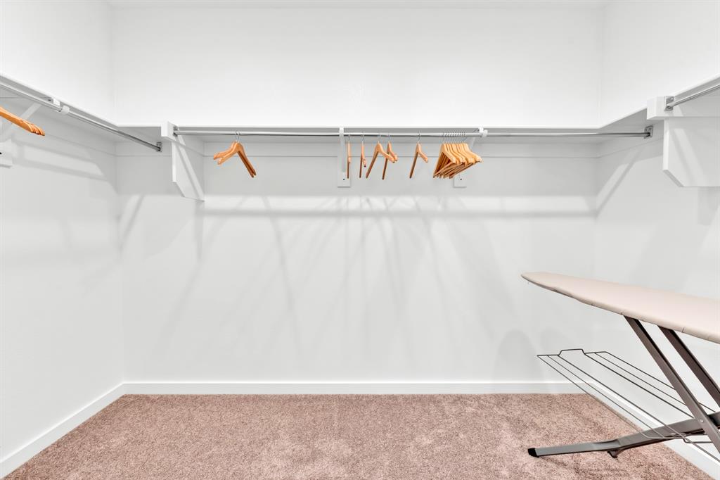 Built-in shelving with hanging rods