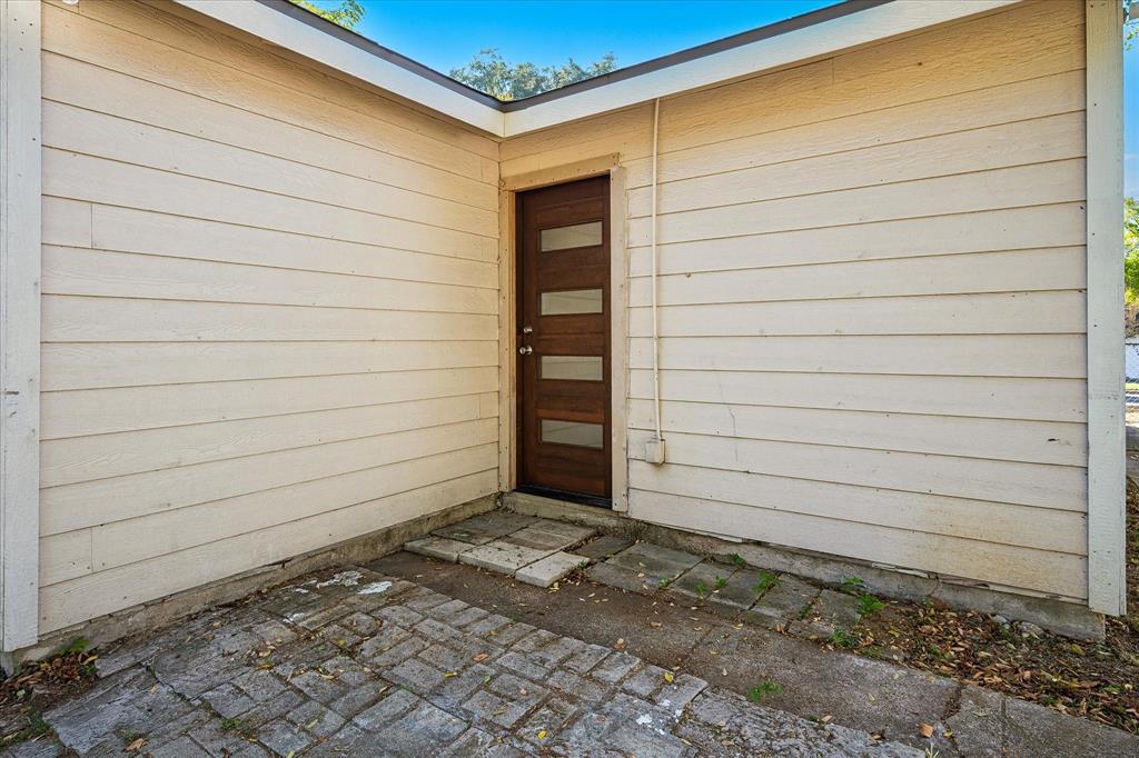 Modern Back Door. Siding all Around.