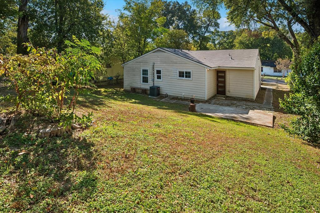 Rear View of Home and Yard
