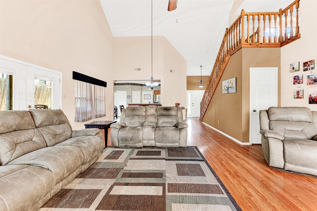 A wide-cased opening offers an effortless transition into the adjoining dining and kitchen areas, unifying the main level. You will love hosting effortless holiday gatherings where guests move comfortably from prep to relaxation.