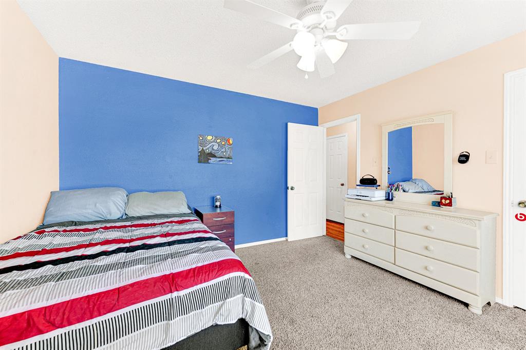 A versatile floor plan offers ample wall space and carpeted floors, giving you complete flexibility for full bedroom suites or a home office setup. It is easy to picture overnight guests settling in comfortably with plenty of room to unpack and feel right at home.