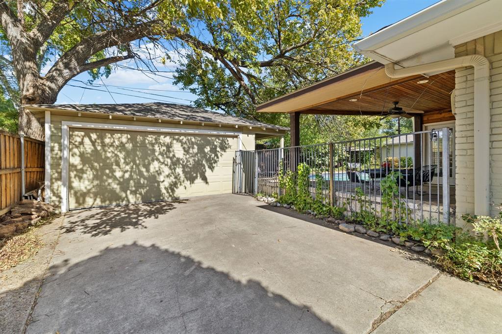 And last but not least, a picture of the 2 car detached garage which is so nice to have and not always easy to find in West Richardson.  Thank you for following along and taking a looking at 824 Westwood Drive.  It's a beautiful home with so many nice options and amenities!