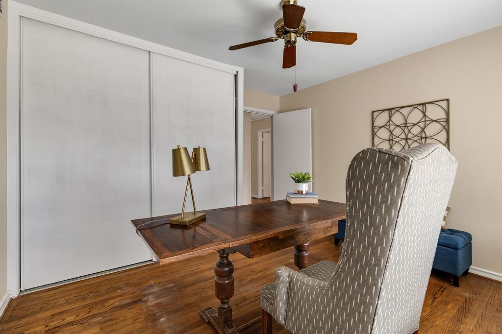 On the opposite wall of the second secondary bedroom, there is a huge closet with tons of shelving and storage.