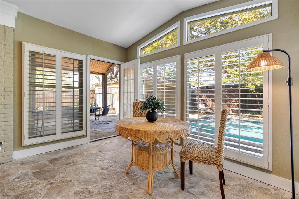 Imagine enjoying a meal or morning coffee from the comfort of your home but views of the gorgeous backyard, trees and pool.