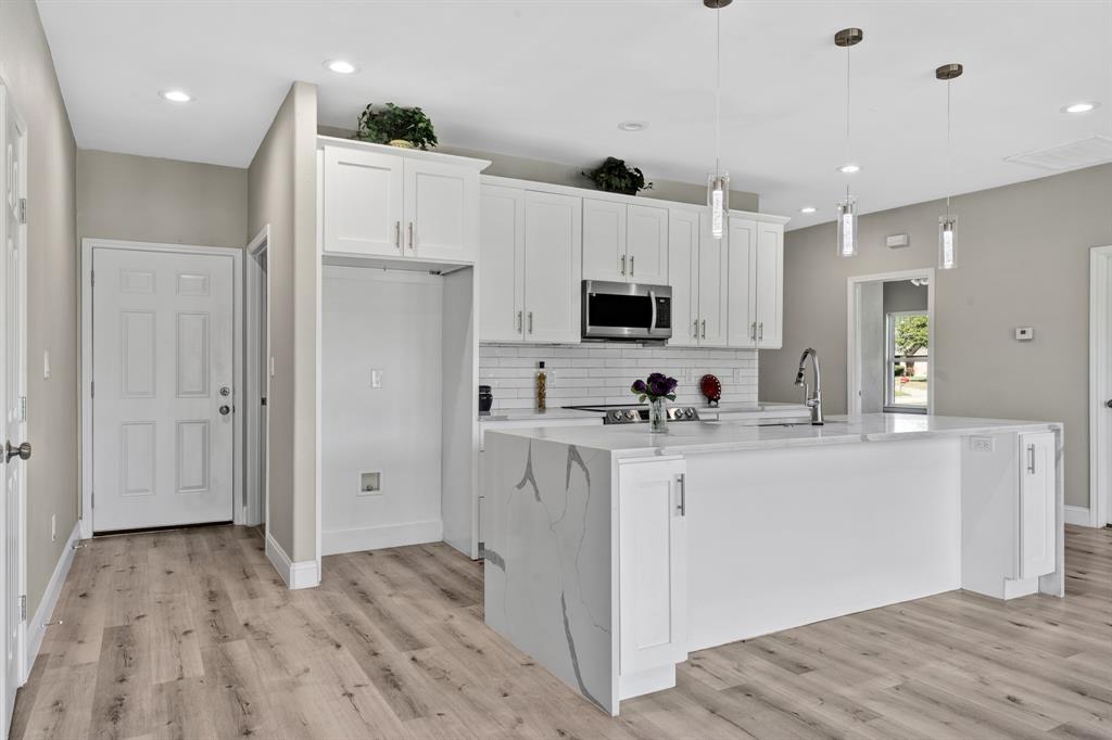 Kitchen with Utility Room  at back - Walk In Pantry is on the left