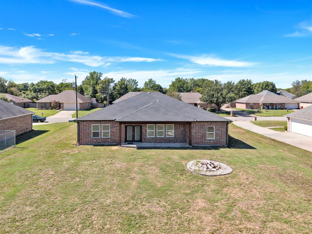 Back of Home with Fire Pit