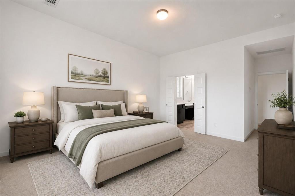 Neutral-toned carpeting, high ceilings, flush-mount lighting, and dual-panel swinging doors Neutral-toned carpeting, high ceilings, flush-mount lighting, and dual-panel swinging doors