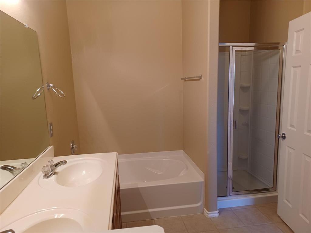 Dual vanity with integral sinks, cultured marble countertop, and chrome faucets