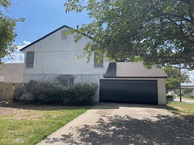 Garage side of 1401 Cherrywood (duplex)
