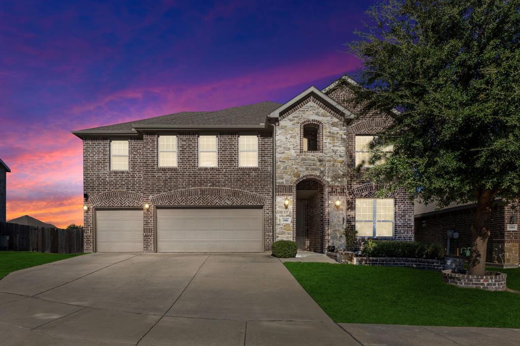 Brick and stone veneer exterior with a gabled roof Brick and stone veneer exterior with a gabled roof
