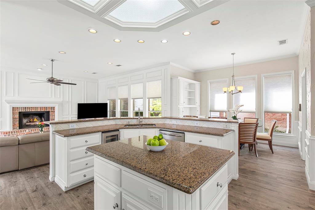 The kitchen opens to the breakfast area and family room, keeping the cook connected to conversation and everyday activities.