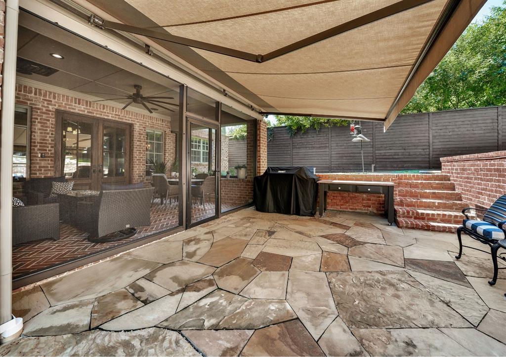 retractable awning off of enclose patio