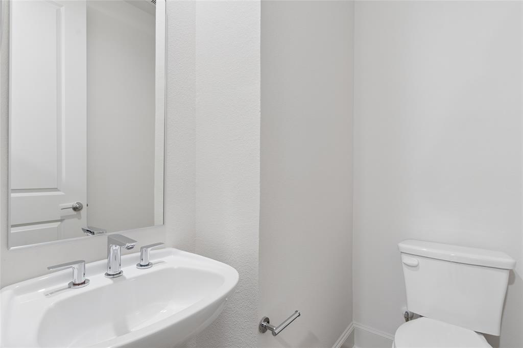 Image of model home with similar layout.