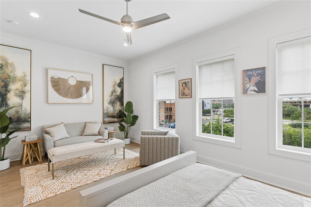 Huge primary bedroom with room for sitting area. Image of model home with similar layout.
