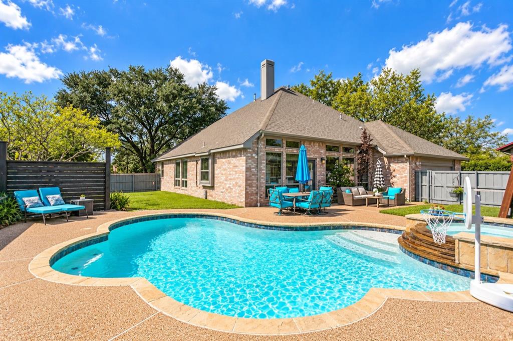 Large grass space to the left, as well as grass to the right of the pool (not shown here).