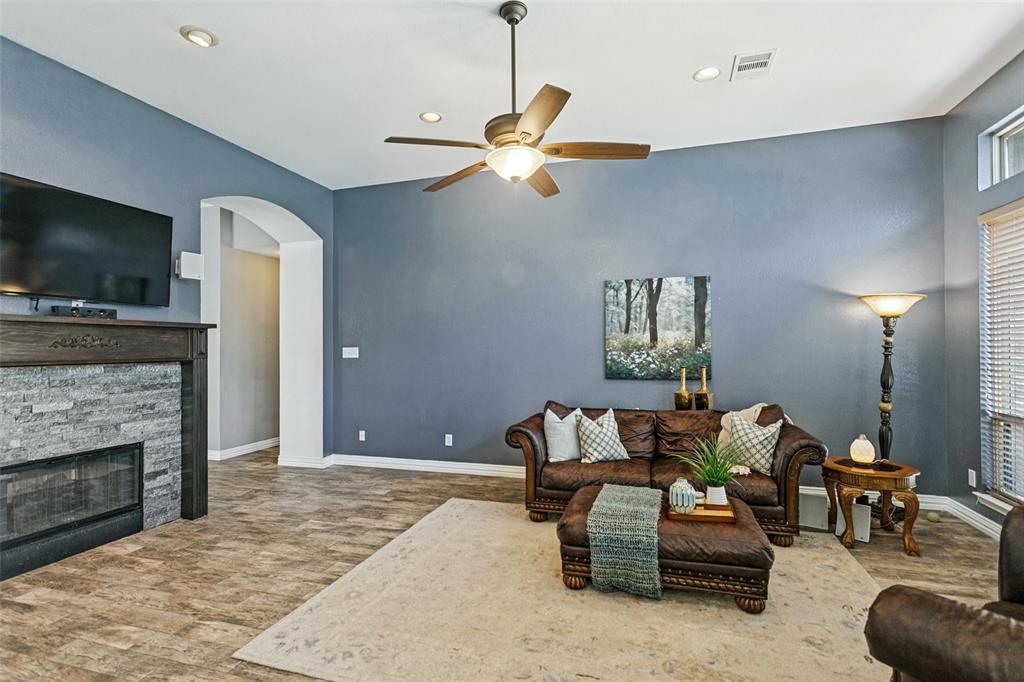 Living room with see-thru gas fireplace.