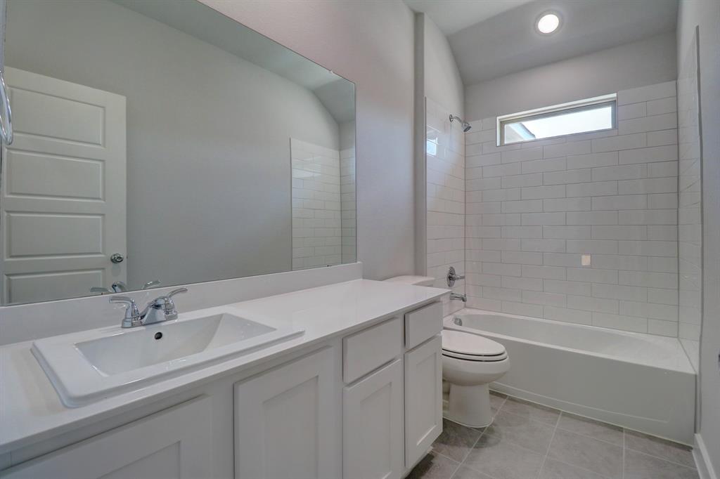 Vanity with integrated rectangular sink and chrome faucet
