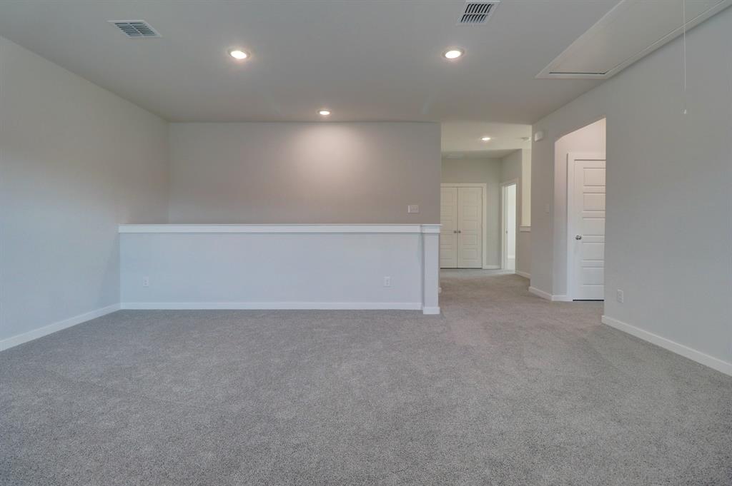 Neutral-toned carpeting throughout
