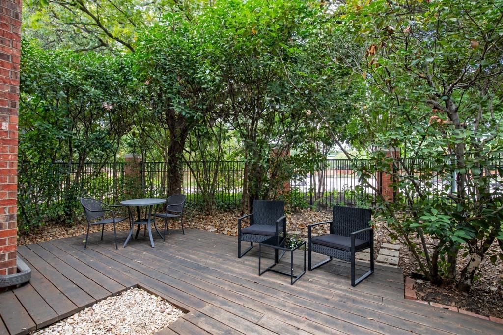 This is a great outdoor living space surrounded by mature trees.
