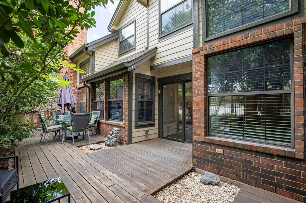 Spacious deck located right off of the dining room and family room.