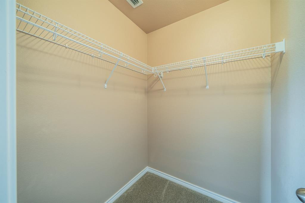 Upstairs bedroom walk-in closet.