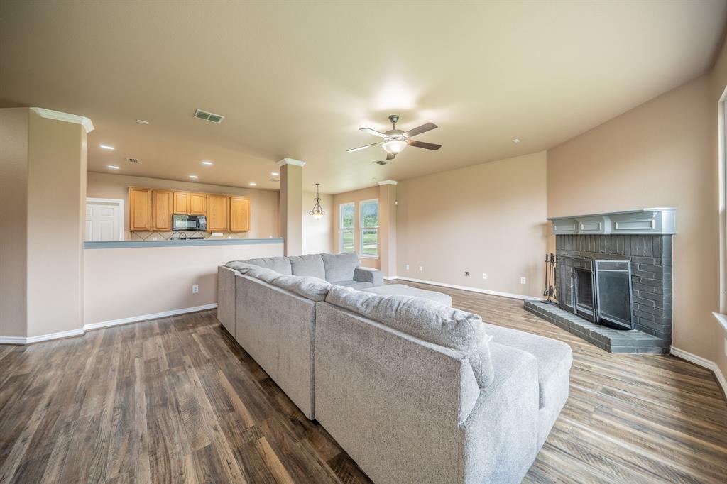Family Room and fireplace with hearth. Family Room and fireplace with hearth.