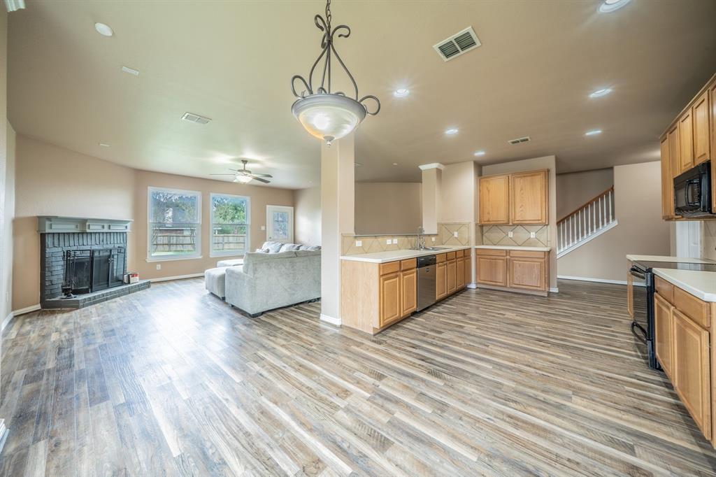 Breakfast nook looking into kitchen and family room. Breakfast nook looking into kitchen and family room.
