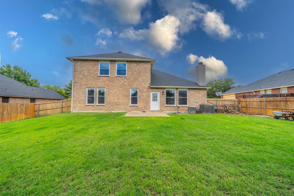 View of the back of the house and yard.