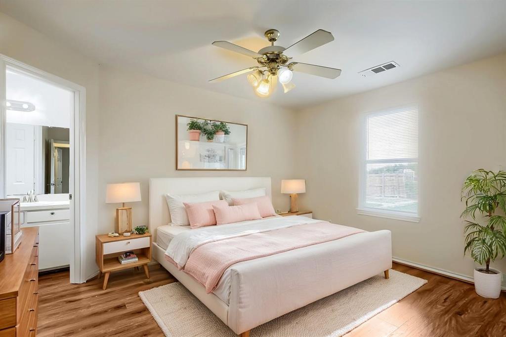 Virtually Staged. Laminate Wood-finish flooring, ceiling fan with integrated lighting, neutral wall palette, and dual-pane window Virtually Staged. Laminate Wood-finish flooring, ceiling fan with integrated lighting, neutral wall palette, and dual-pane window