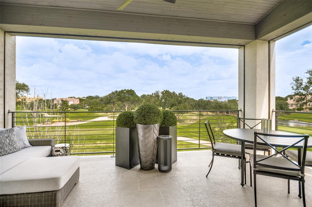 Relax on the private terrace where electric shades provide comfort and year-round enjoyment