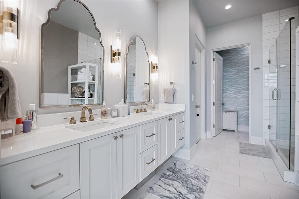 The primary bath is a true spa-like sanctuary for relaxation