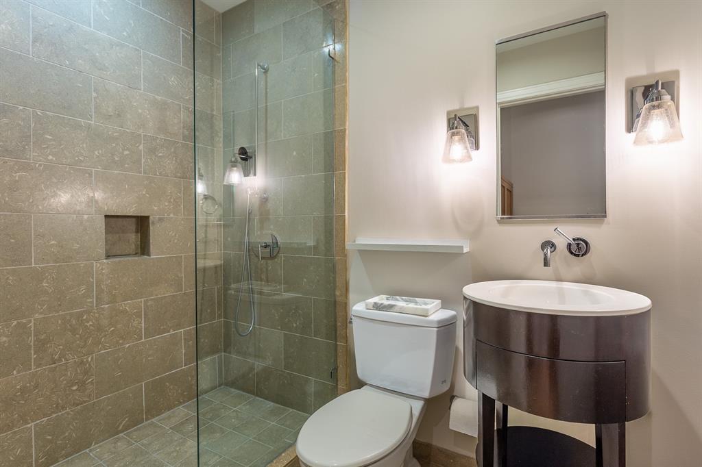 Guest Bath has large shower.