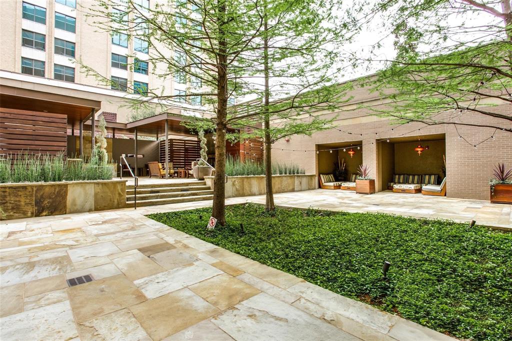 Courtyard with covered sitting areas and outdoor fireplace. There is also a separate dog park so even your dog can socialize!