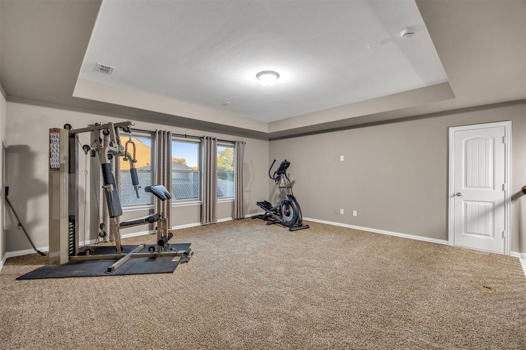 The upstairs flex room could be a bedroom or game room.